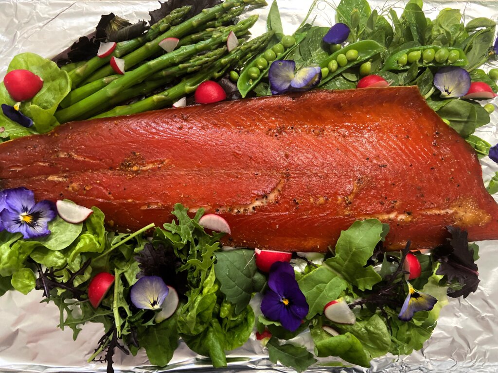 smoke salmon on a bed of greens